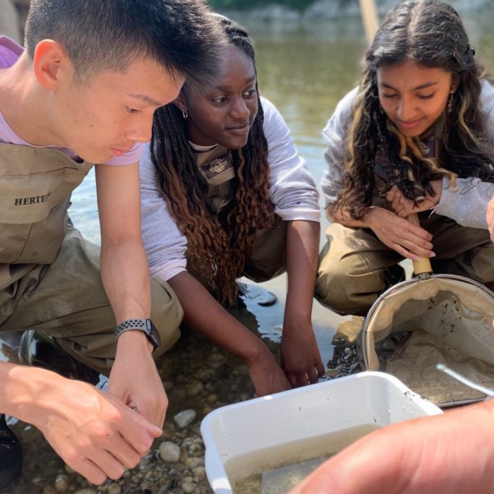 Shanya and Shads participating in the AquaSONG lab at Grand River where they looked for organisms to study under a microscope